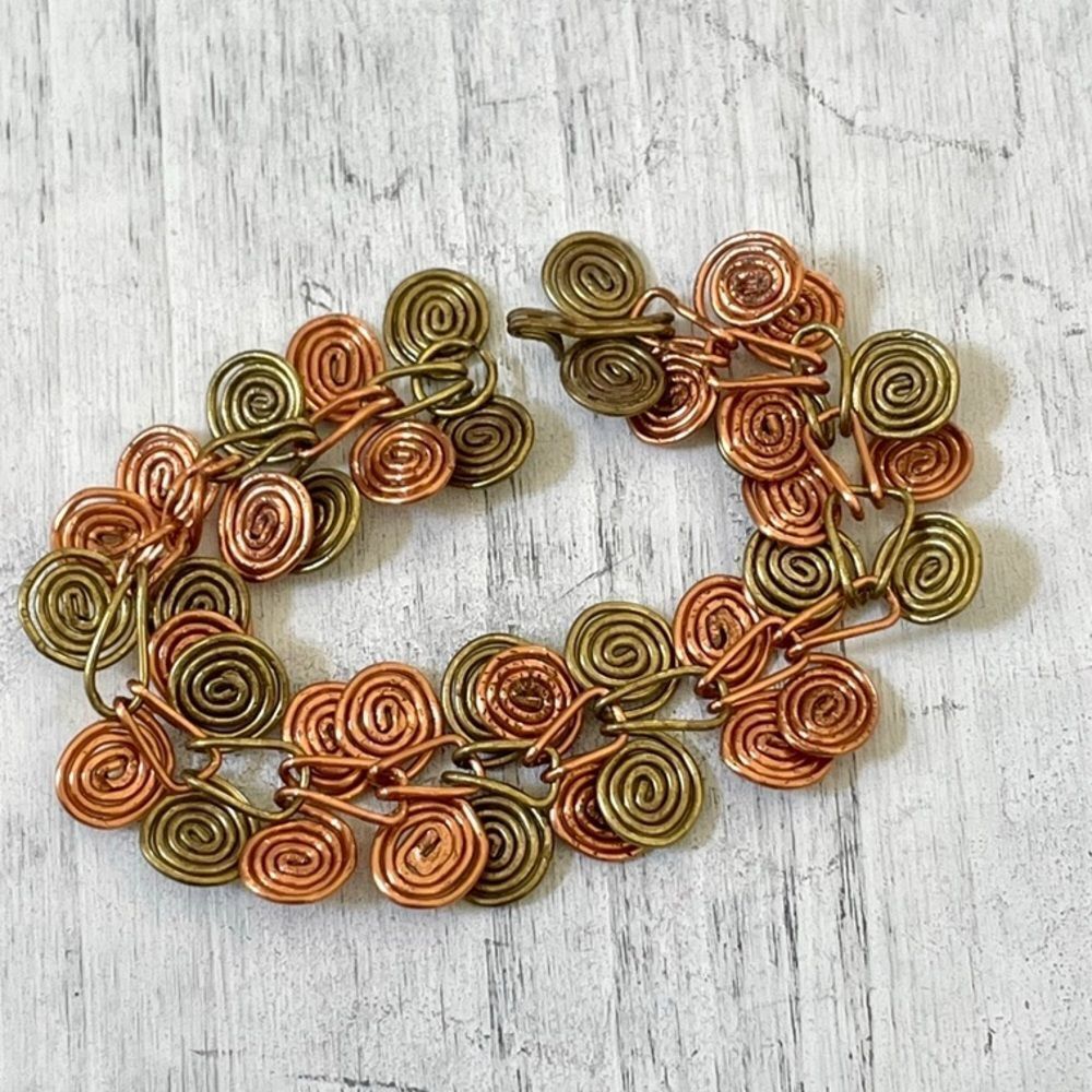 Copper and gold tone colored bracelet
